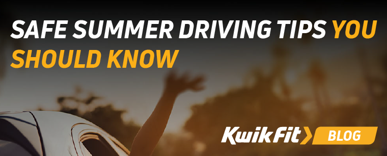 An arm out of the window of a car